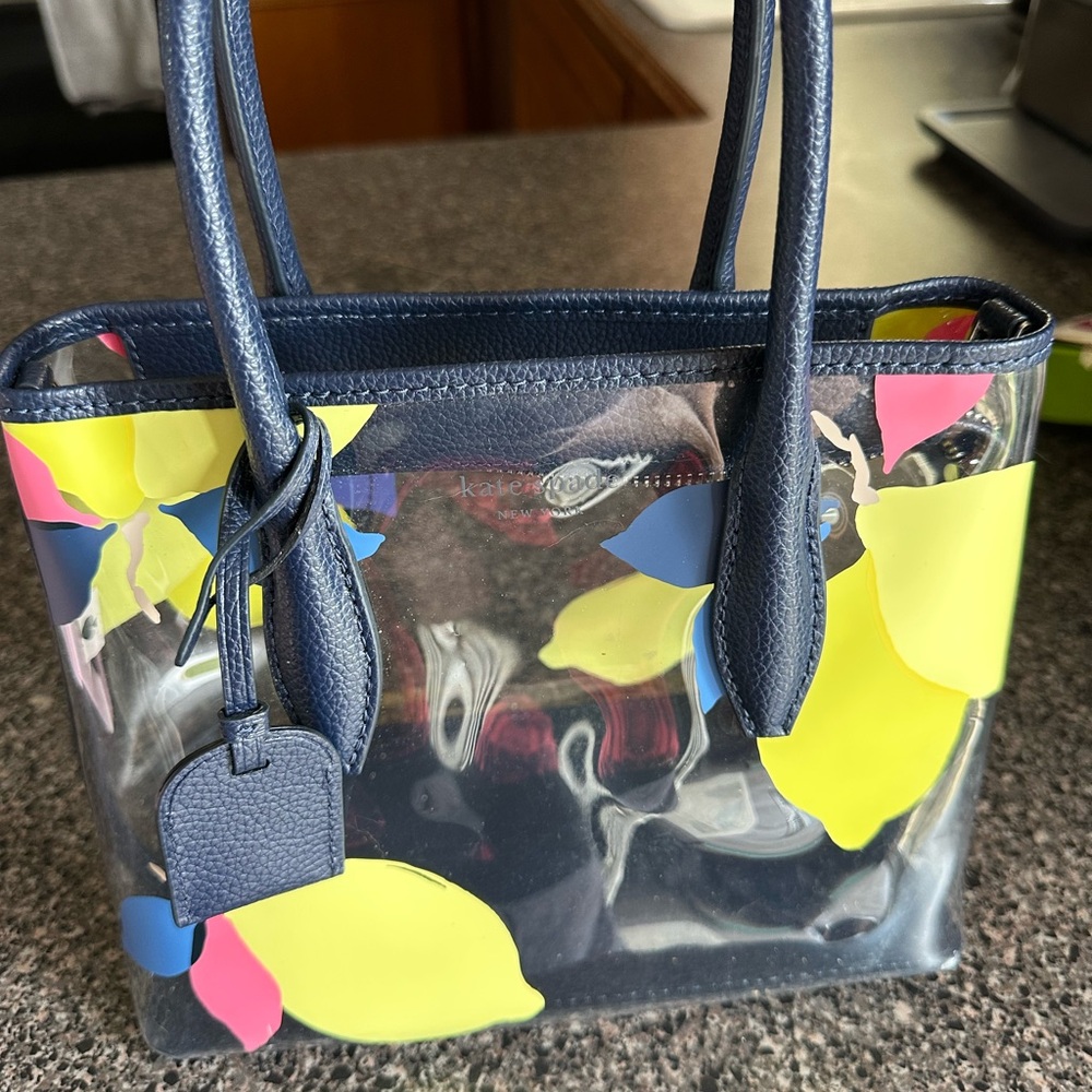 Kate Spade Transparent Bag with Colorful Floral Design